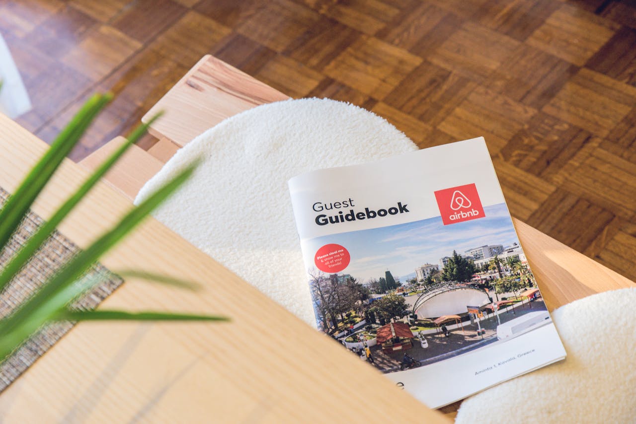 gallery-5 Airbnb Guest Guidebook on a modern table in Kavala, Greece home.